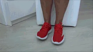 Toe wiggling in red sneakers b