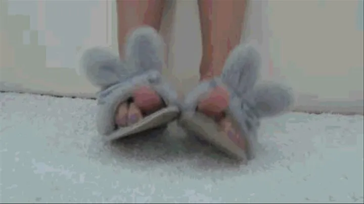 Toe tapping and toe wiggling in slippers with ears a