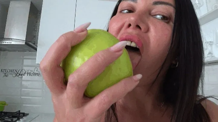 I bite a green apple and chew it a