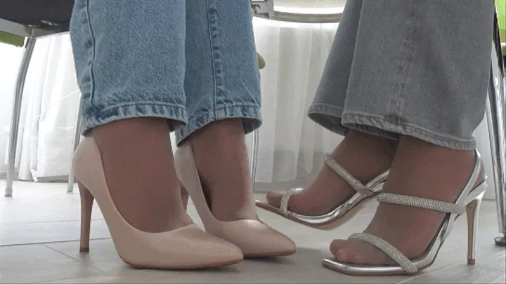 Footsie under the table in nylon tights Eb