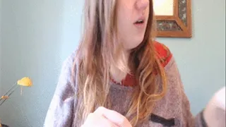 Nose blowing and sneezing in purple jumper