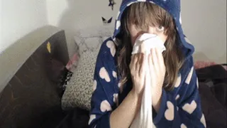 Onesie bed time sneezing into hanky