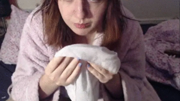 Sneezing and nose blowing in pink bath robe