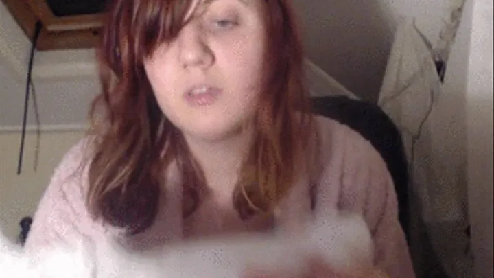 Blowing nose into tissue paper