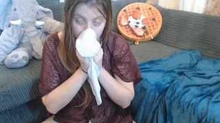 Nose blowing in net dress