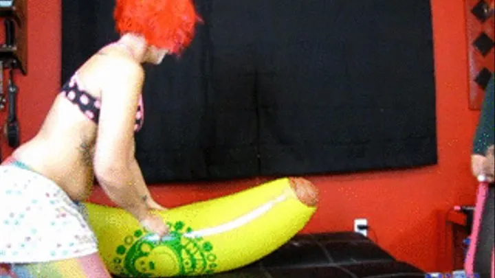 2 clowns hump a giant banana