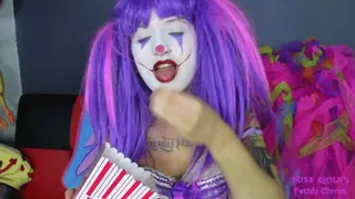 Clown Girl Eats Popcorn