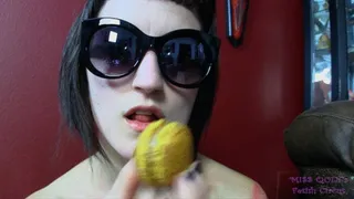 Eating Macarons in Sunglasses