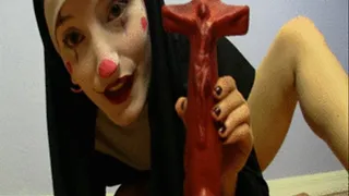 Clown Nun Fucks Self with Crucifix Dildo