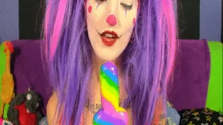 Clown sucks a Lolli-Cock