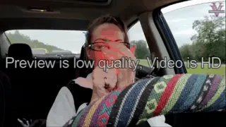 Smoking a J in the car with glasses