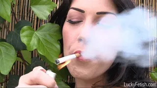 Kymberly Jane Sexily Takes Drags Off Her Cigarette And Blows The Smoke In Your Face
