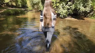 Adidas and jeans in a creek