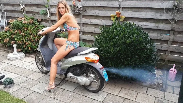 Leah Lee Revving Old Scooter