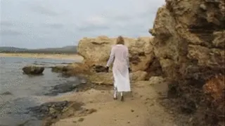 Nanalou soaking her silver boots @ the beach