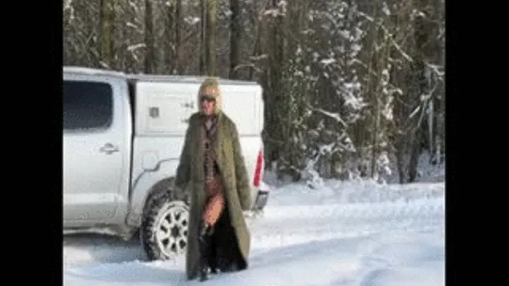 Nanalou walking in the snow with thigh boots