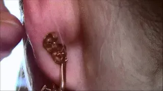 Fresh piercings in the ear