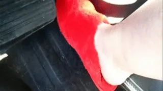 Revving Uhaul Truck In Red Slippers