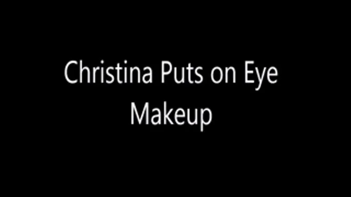 Christina Puts on Eye Make Up