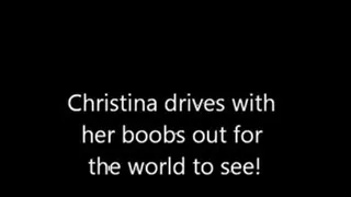 Christina drives with boobs out