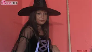 Charming witch Jessika in black pantyhose and bewitching high heels HQ