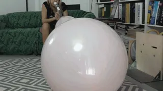 Nikki Blows an RCR 24x36" balloon