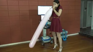 Kitty Blows Entertainer Balloons