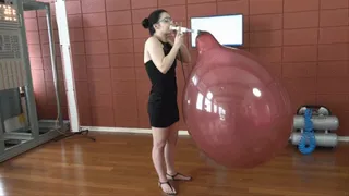 Natasha Blows a Tuf-Tex 24" Balloon to Bursting