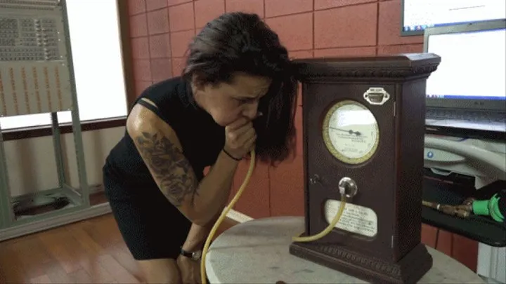 Mandy Tries Out the Penny Arcade Lung Tester