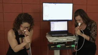 Bailey and Dacey Test Their Blowing Pressure