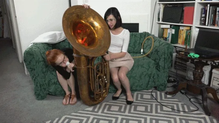 Dolly and Nora Experiment With Ways to Plug a Tuba