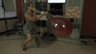 Claire Blows a Double-Stuffed Pair of BSA 17-inch Balloons to Bursting