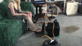 Krystal Inflates a Tire Inner Tube