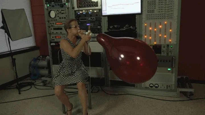 Claire Blows a BSA 17-inch Balloon to Bursting
