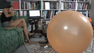 Stefania Blows a Soccer Ball Bladder to Destruction