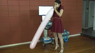 Kitty Blows Entertainer Balloons