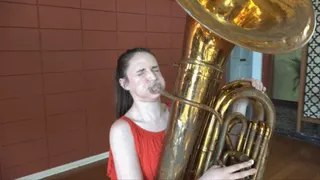 Luci Tries Out the Tuba