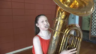 Luci Tries Out the Tuba