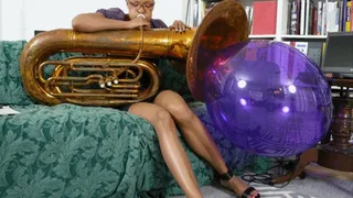 Qandisa Inflates a Balloon in the Bell of Her Tuba