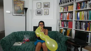 Kimmy Compares Two Different Corkscrew Balloons