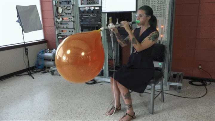 Mia Blows a Double-Stuffed Pair of BSA 17-inch Balloons to Bursting