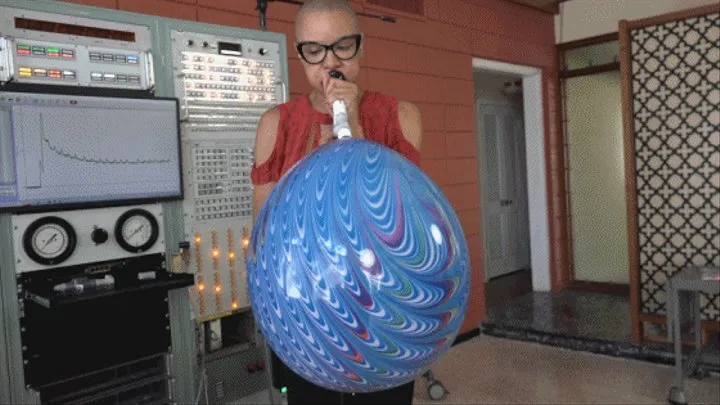 Khi Blows a Suzuki Peacock Balloon to Bursting