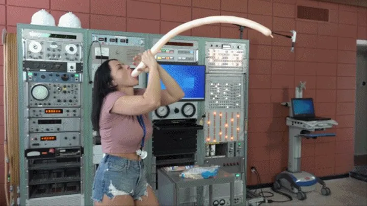 Nadia Practices Her Balloon Swallowing Trick