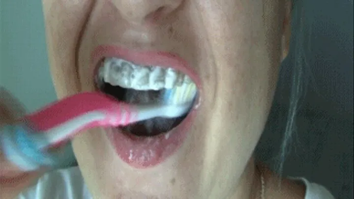 To brush teeth it is close to the camera.