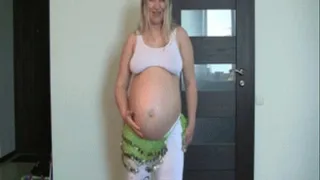 Dance of the pregnant beautiful and sexual blonde..