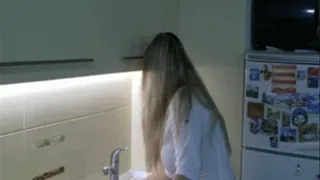 Hair washing in the Kitchen.