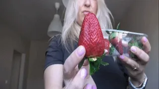 Swallowing a whole giant strawberry a