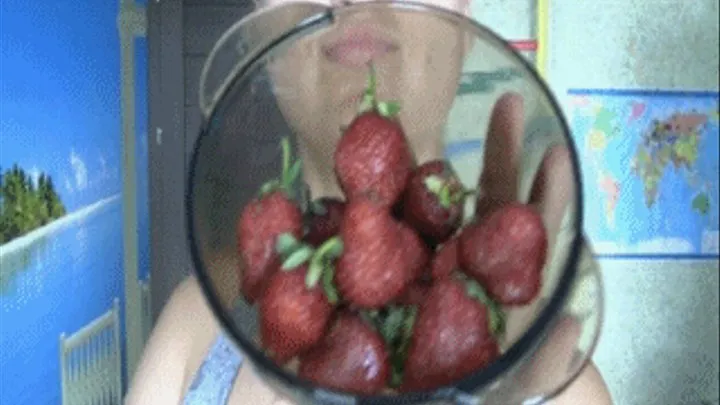 Firm swallowing of strawberry.