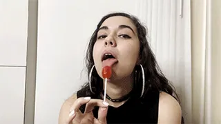 Peko Sucks on a Red Lollipop