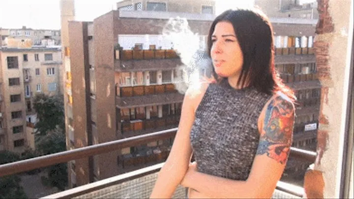 Kelly Smoking on Balcony